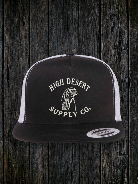 Chukar Logo Flat Brim Black/White front - real embroidered logo, dark wood style
