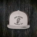 Chukar Logo Flat Brim Silver/Black front - real embroidered logo, dark wood style, logo-size fix v6 (no bottom-text ghosting)