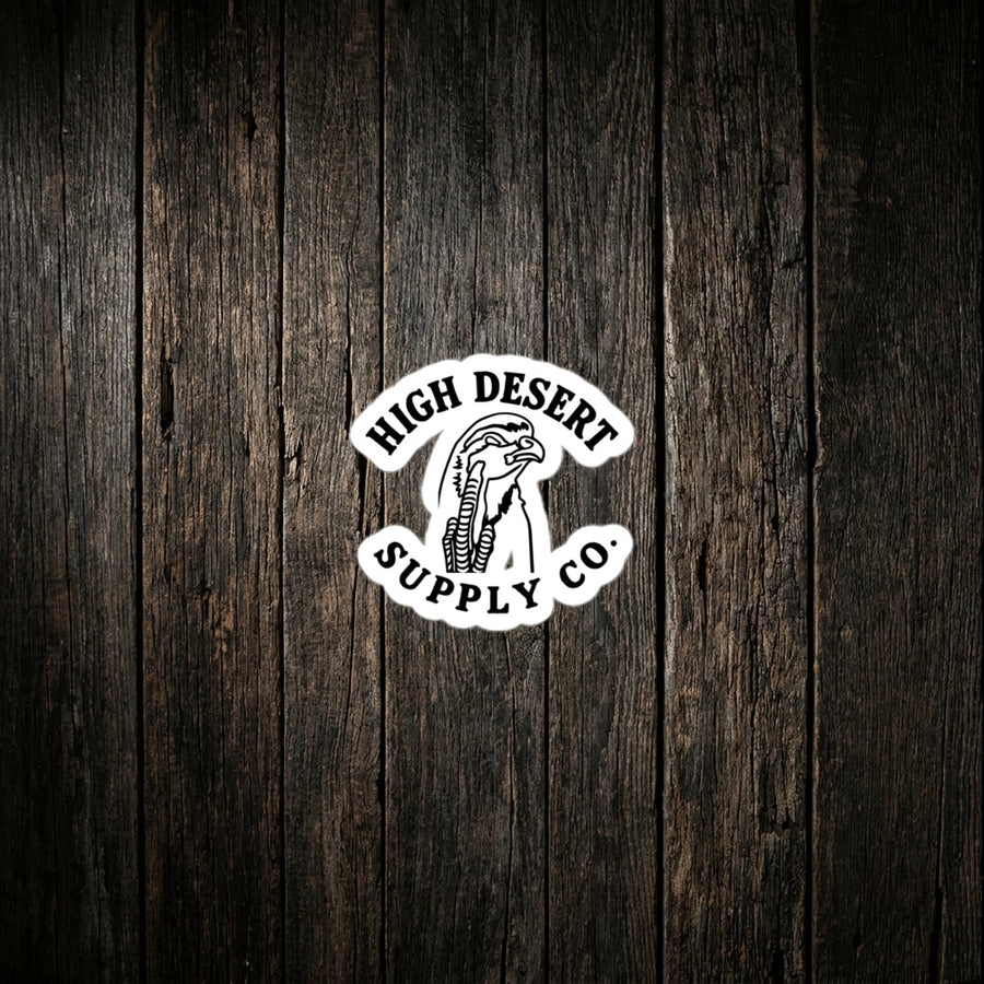 HDS Chukar Logo Sticker on dark wood background